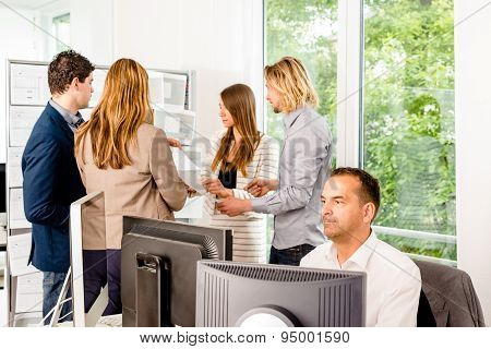 Businesspeople working in office