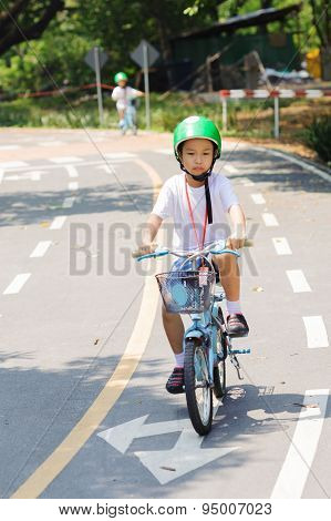 Boy Practice Biking On The Road
