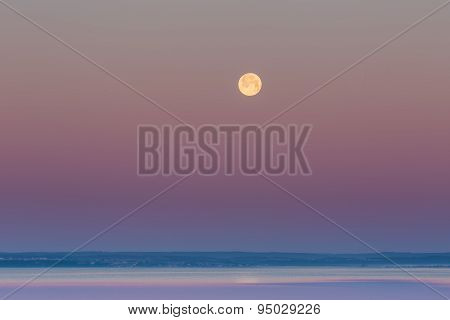 Moon Setting Over Gdanska Bay In Poland