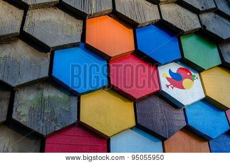 A Wall Of House Covered With Wooden Elements