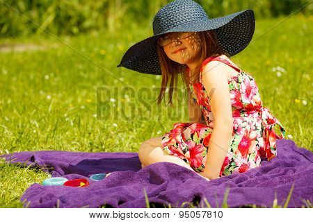 Cute Little Girl In Big Hat Pretending To Be Lady