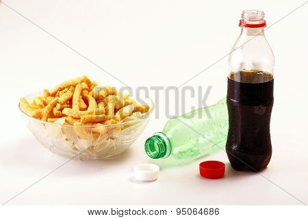 Bottles of softdrinks or soda, chips