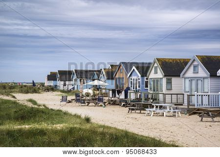 Lovely Beach Huts On Sand Dunes And Beach Landscape
