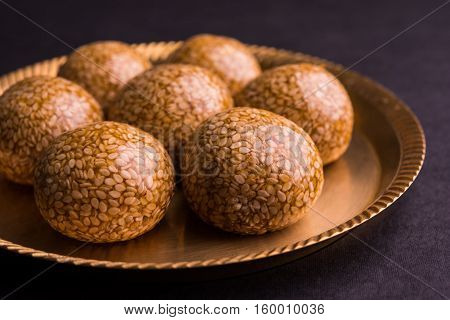 Til ke Ladoo or Til laddu or sesame sweet laddu