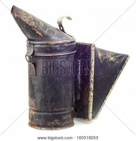 Old bee smoker isolated on white background.