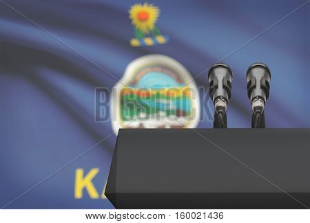 Pulpit And Two Microphones With Usa State Flag On Background - Kansas