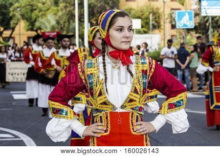 SELARGIUS, ITALY - September 13, 2015: Former marriage Selargino - Sardinia - portrait of a beautiful girl in the folk group Sant'Antonio Abate of Desulo
