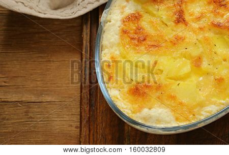 Traditional French potato gratin with cream and cheese