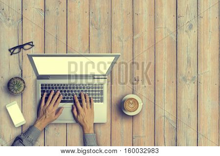 Top View Of Business People Working With Using Digital Laptop Computor, A Cup Of Latte Coffee, Glass
