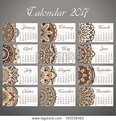 Vector calendar 2017 with decoraive elements. Vector mandala design. Template can be used for web and print design.