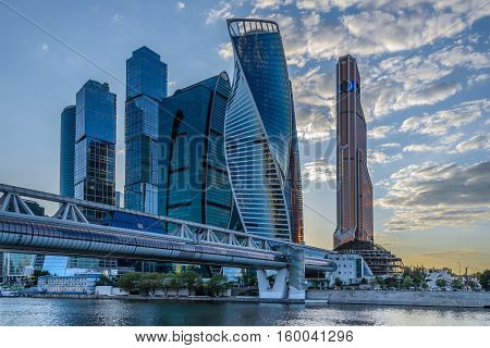 Pedestrian bridge over the river to the complex of buildings Moscow City