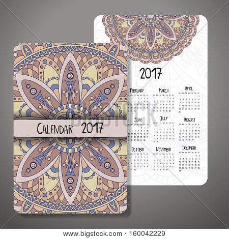 Vector calendar 2017 with decoraive elements. Vector mandala design. Template can be used for web and print design.