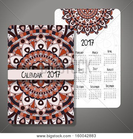 Vector calendar 2017 with decoraive elements. Vector mandala design. Template can be used for web and print design.