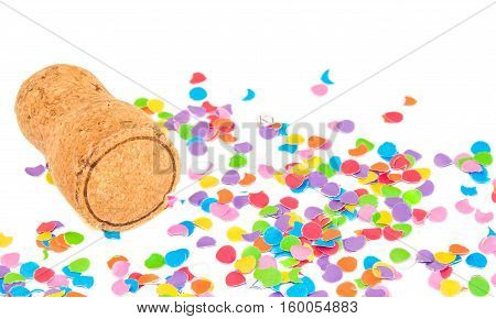 Champagne cork on confetti background. Holidays and events concept.