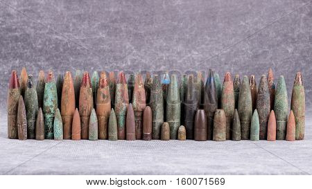 Objects of war, old and rusty bullets.