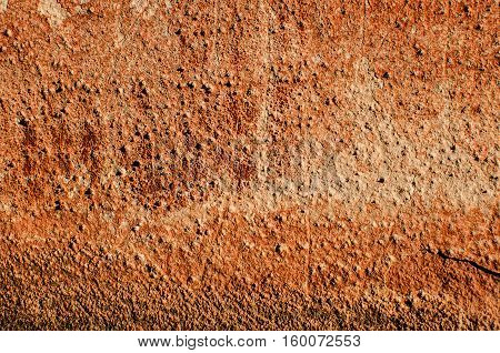 Texture of wall painted with red lead