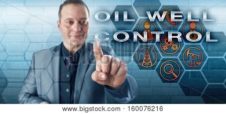 Happy male petroleum engineering manager with toothless smile is pushing OIL WELL CONTROL on an interactive virtual control screen monitor. Oil and gas industry metaphor and fossil fuels concept.