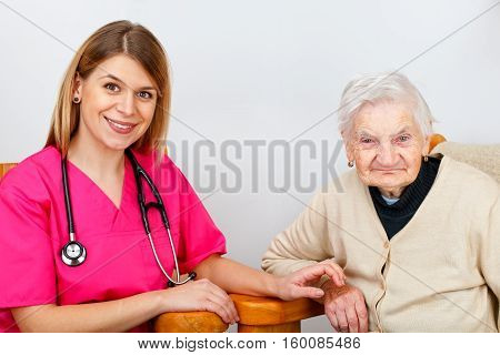 Picture of a senior woman with her caregiver