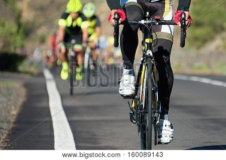 Cycling competition,cyclist athletes riding a race at high speed