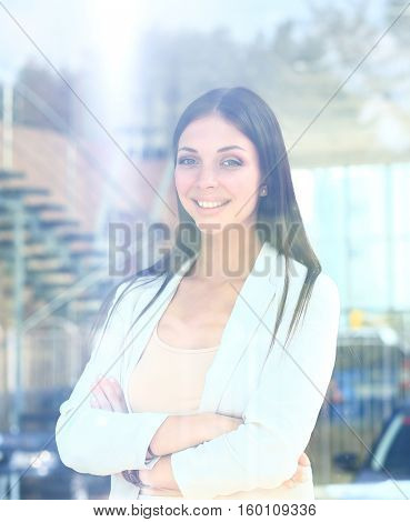 business woman looking thtough window in the office