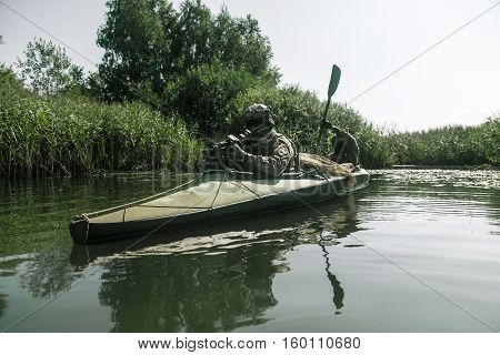 Special forces operators in the military kayak