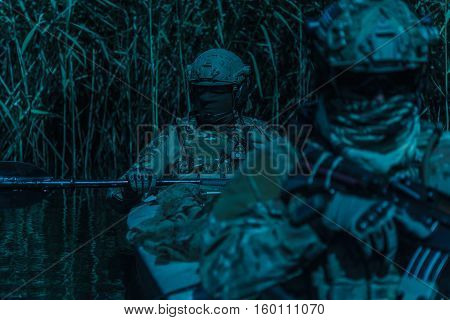 Special forces operators in the military kayak