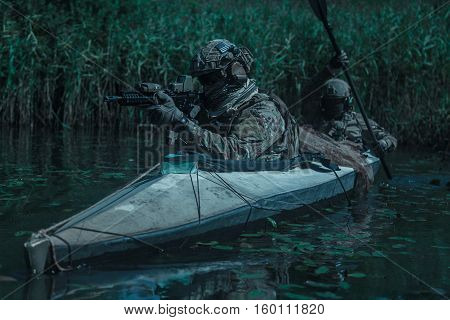Special forces operators in the military kayak