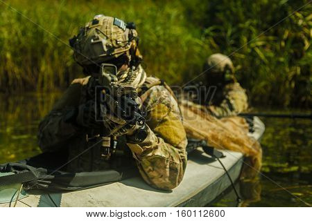 Special forces operators in the military kayak