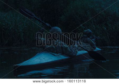 Special forces operators in the military kayak