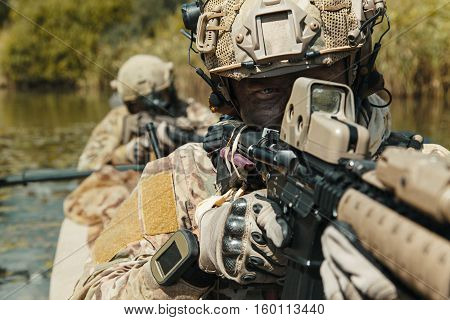 Special forces operators in the military kayak