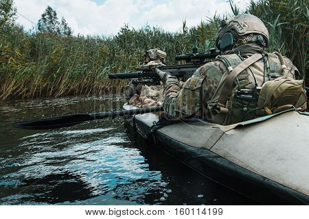 Special forces operators in the military kayak