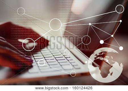Side view and close up of hands using laptop with abstract globe connected lines and binary code. Technology and communications concept