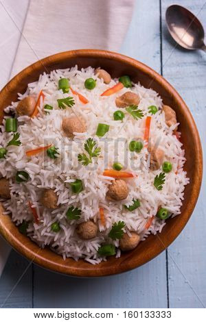 Yummy soya pulao or pilav or pulav or rice or soyabean chunk fried rice with peas and beans, indian or pakistani cuisine