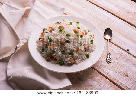 Yummy soya pulao or pilav or pulav or rice or soyabean chunk fried rice with peas and beans, indian or pakistani cuisine