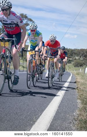 Jindabyne, Snowy Mountains Region, Australia - December 3, 2016: The first L'Etape cycling event held in Australia (by Le Tour de France).  Fatigue is starting to set in at the final hill of the 5th stage of 6.