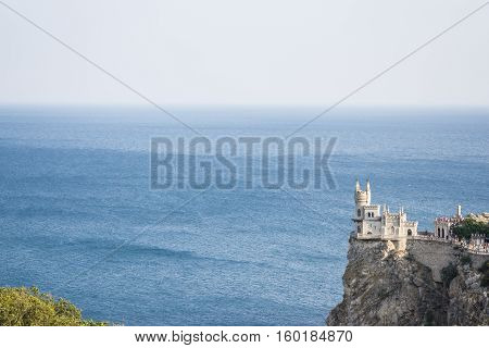 The decorative Neo-Gothic castle Swallow's Nest on the rock over the Black Sea. Gaspra. Crimea