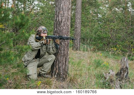 armed men in the area of armed conflict