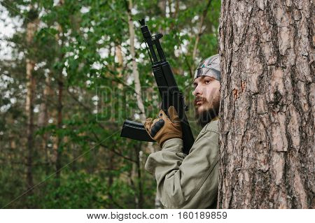 armed men in the area of armed conflict