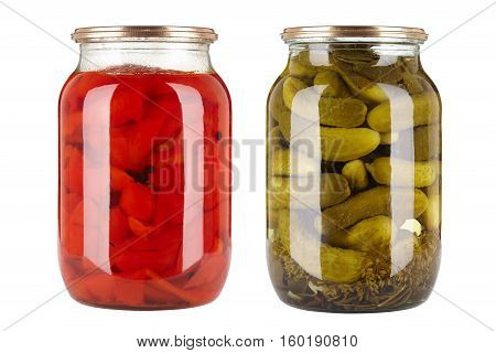 canned vegetables in glass jars isolated on white