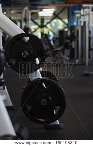 Fintess gym club with heavy weights  equipment. Modern gym for exercise
