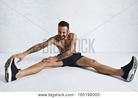 Stretching Fitness Routine In White Room