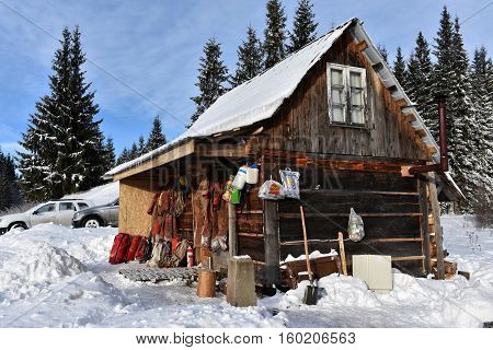 Cave Exploration Equipment Hanged On A Wooden Cabin