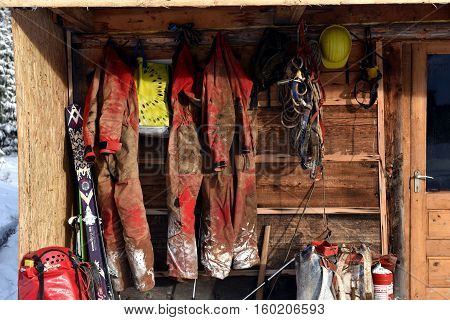 Cave Exploration Equipment Hanged On A Wooden Cabin