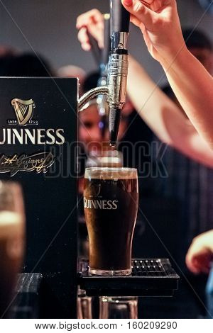 Pint of guinness placed on top of draft counter at Guinness Storehouse Brewery - 17.july 2012