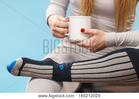 Girl In Thermal Underwear Drinking Tea