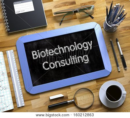 Top View of Office Desk with Stationery and Blue Small Chalkboard with Business Concept - Biotechnology Consulting. Biotechnology Consulting Handwritten on Small Chalkboard. 3d Rendering.