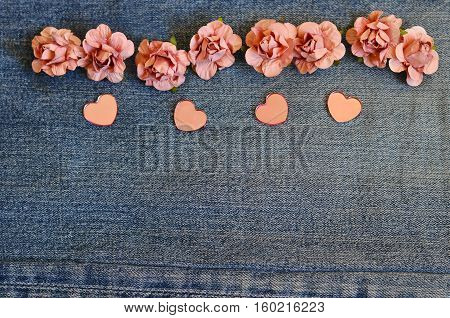 on jeans background laid roses and hearts. Backgrounds Valentine's Day. Wedding background. love card