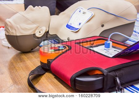 cpr with aed training and blur background