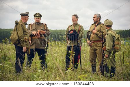 POKROVSKOE SVERDLOVSK OBLAST RUSSIA - JULY 17 2016: Historical reenactment of Russian Civil war in the Urals in 1919. Soldiers Of The White Army