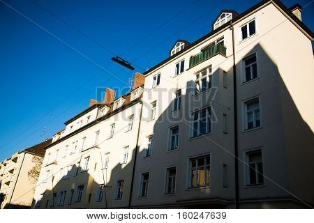 old houses in munich - schwabing - blue sky